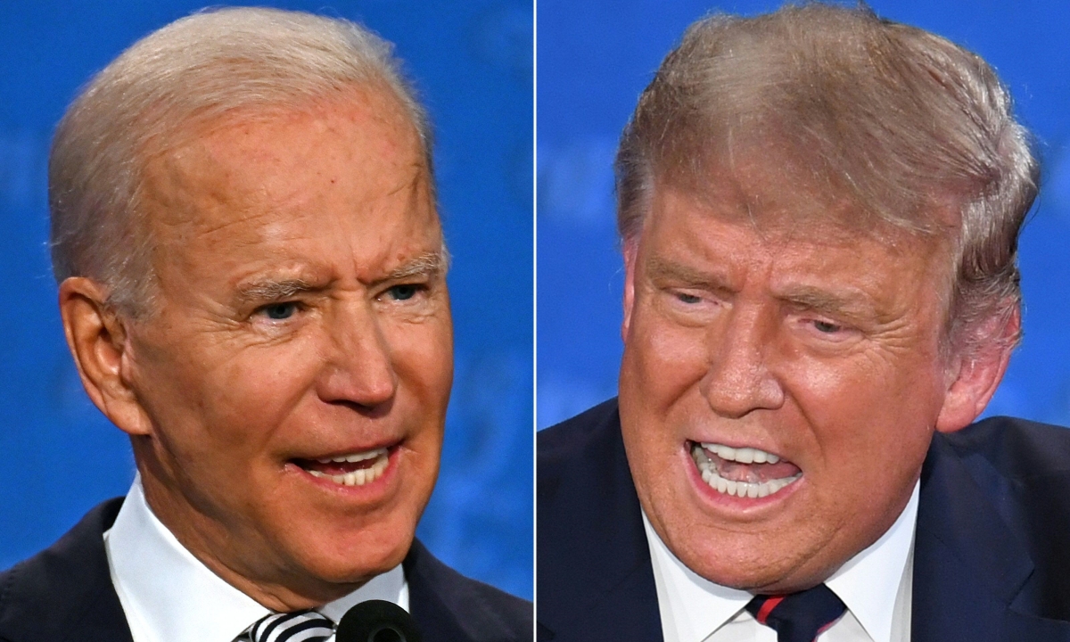 Tổng thống Mỹ Trump (phải) và ứng viên đảng Dân chủ Joe Biden tại cuộc tranh luận đầu tiên ở Ohio ngày 29/9. Ảnh: AFP.